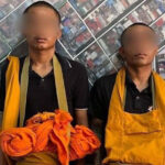 プノンペンの市場で偽僧侶2人を拘束