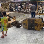 プノンペン　クレーン崩壊で家屋が被害に