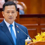 訪日中の首相は国民に冷静さを促し、国境情勢管理を首相指揮下と強調