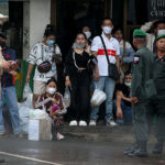 タイから帰国の出稼ぎ労働者は政府の援助を受ける