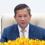 首相　国境再開の方針を再確認