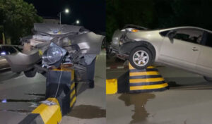 プノンペンの道路の分離帯に中国人運転手の車が激突、乗り上げ