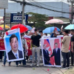 抗議者たちは国立銀行へ、H-Pay銀行資金の返還を要求