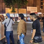 プノンペン　警察が自動車窃盗団を逮捕する際に銃声が響く